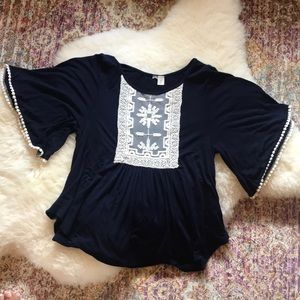 Francesca’s cute navy shirt